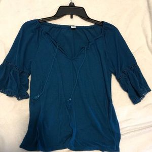 A turquoise blouse